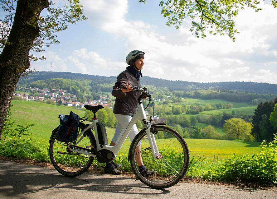 Lady Walking Electric Bike