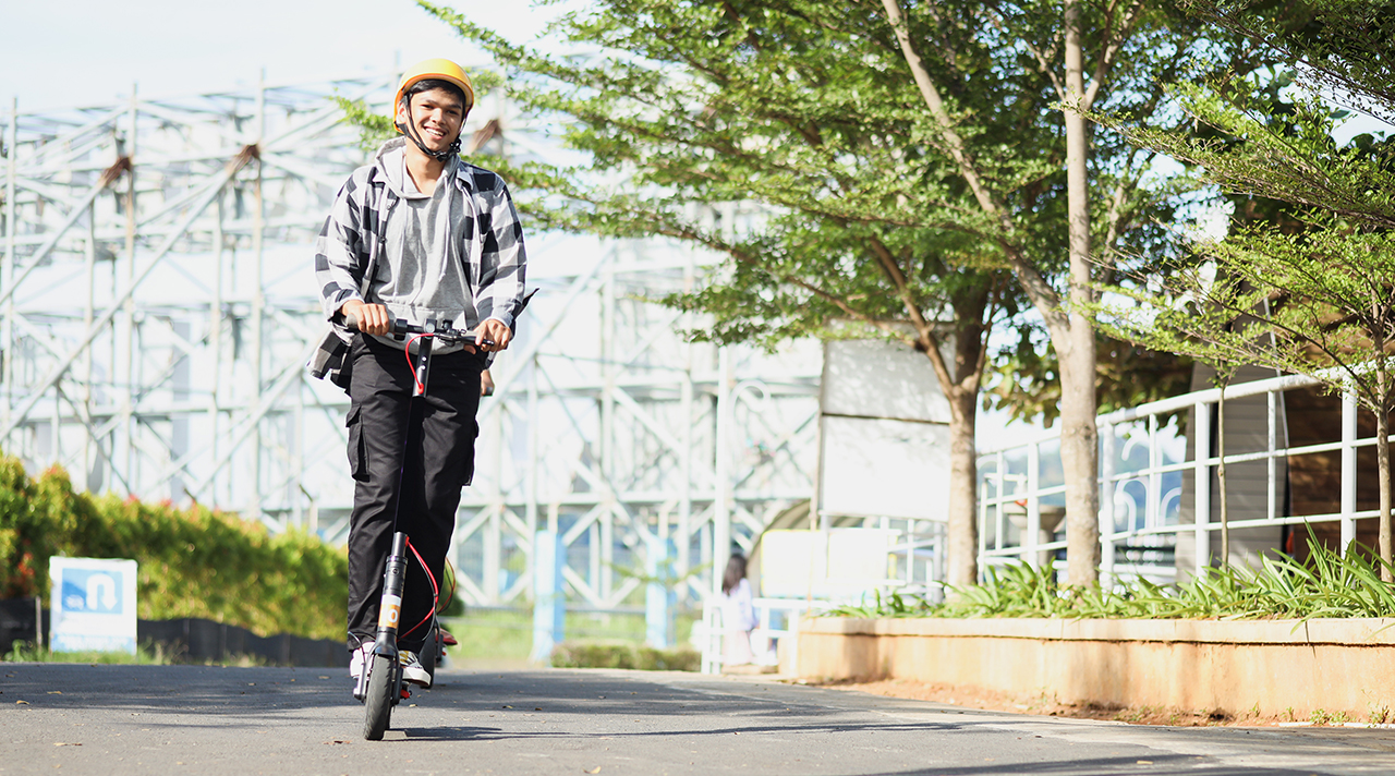 Man on Electric Scooter